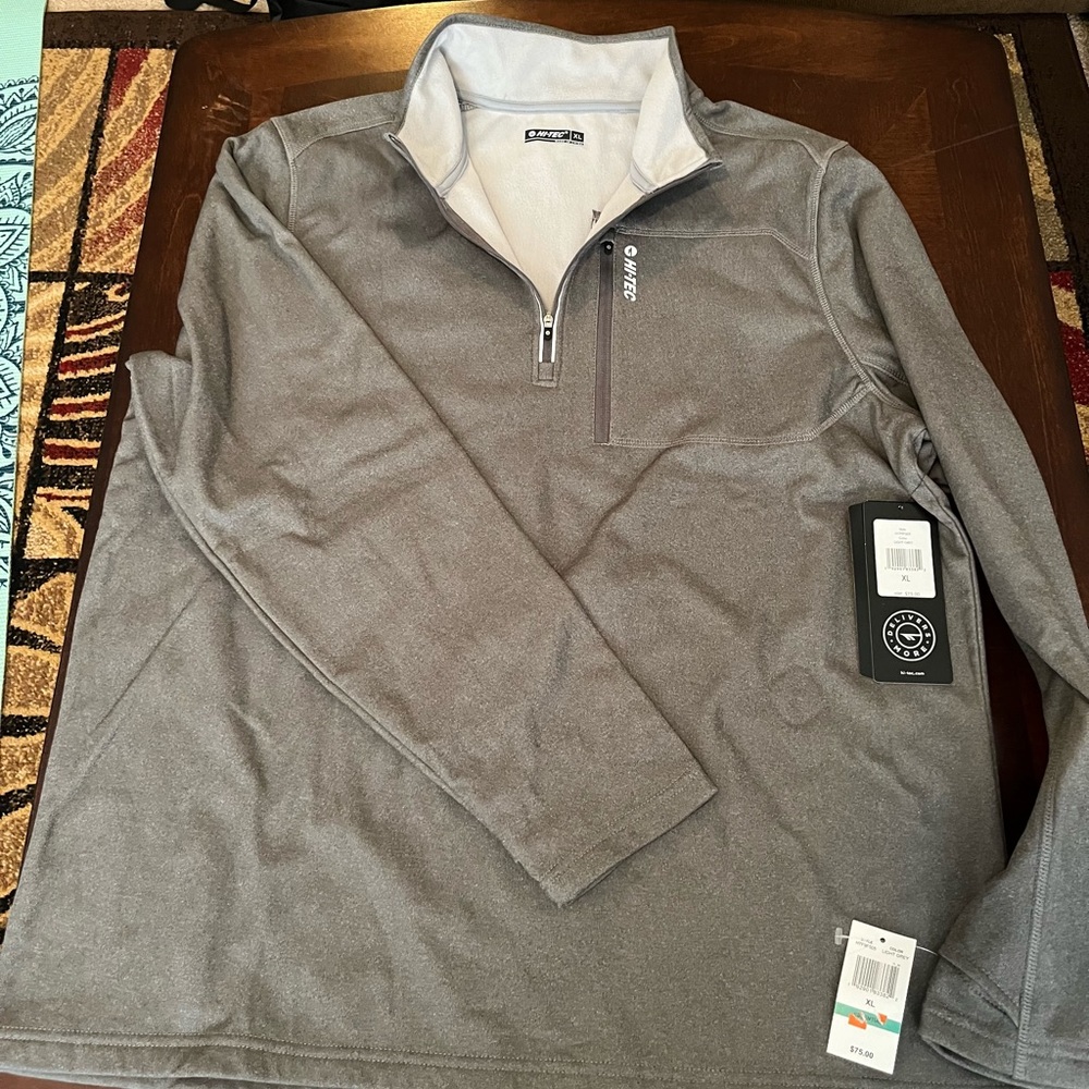 Hi-Tec thermo quarter zip jacket. Excellent condition, never worn, size XL.